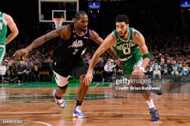 Jayson Tatum of the Boston Celtics drives to the basket against the LA Clippers on December 29, 2022 at the TD Garden in Boston, Massachusetts. NOTE...