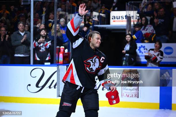 Kyle Okposo of the Buffalo Sabres celebrates with the crowd after being announced as the first star with scoring 3 goals after an NHL game against...