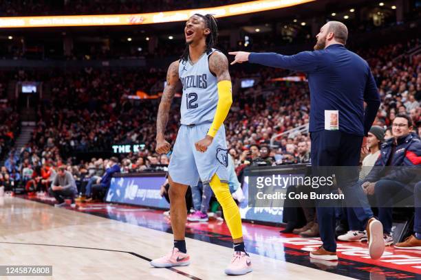 Ja Morant of the Memphis Grizzlies reacts during second half of their NBA game against the Toronto Raptors at Scotiabank Arena on December 29, 2022...