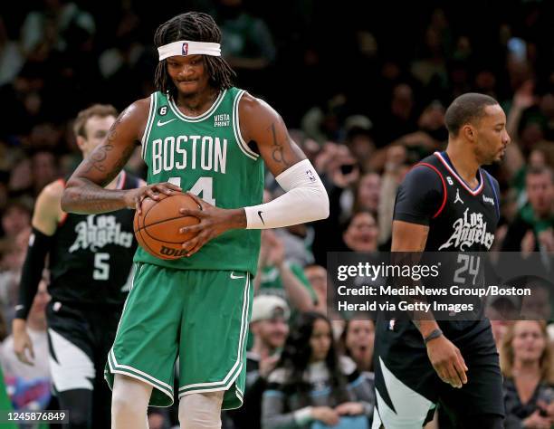 December 29: Robert Williams III of the Boston Celtics shows his frustration as Norman Powell of the LA Clippers walks off during the second half of...