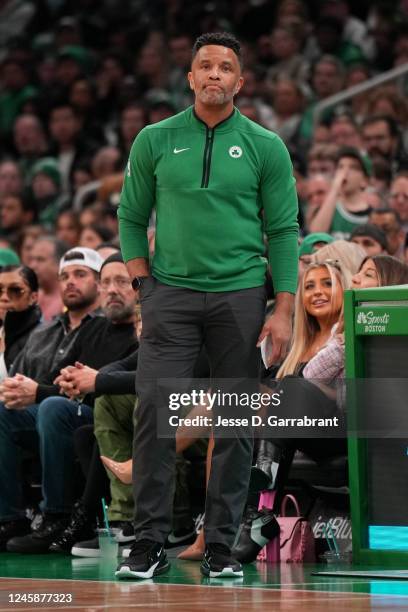 Assistant Coach Damon Stoudamire of the Boston Celtics looks on during the game against the LA Clippers on December 29, 2022 at the TD Garden in...