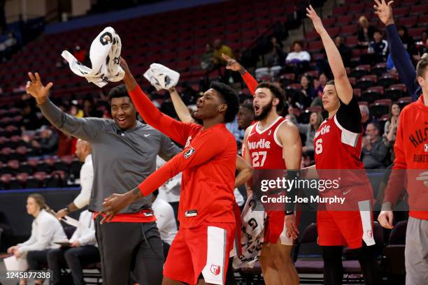 Darnell Cowart, Romeo Weems, David Roddy and Kenneth Lofton Jr. #6 of the Memphis Hustle celebrate from the bench against the South Bay Lakers during...