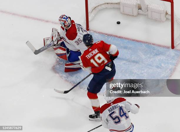 Matthew Tkachuk of the Florida Panthers scores a second period goal past Goaltender Sam Montembeault of the Montreal Canadiens at the FLA Live Arena...