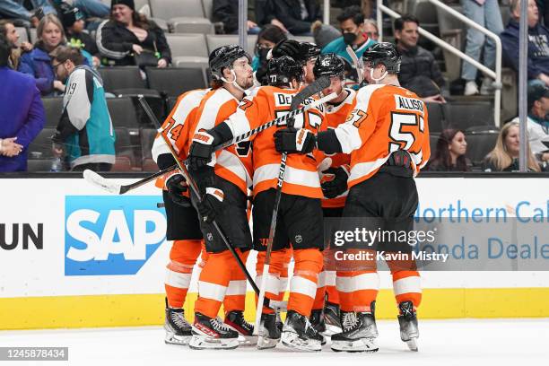 The Philadelphia Flyers celebrate the overtime win against the San Jose Sharks at SAP Center on December 29, 2022 in San Jose, California.