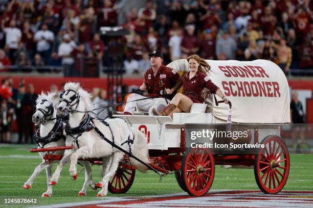 The Sooner Schooner makes its way onto the field prior to the Cheez-It Bowl between the Florida State Seminoles and the Oklahoma Sooners on December...