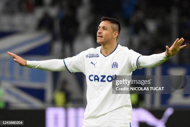 Marseille's Chilean forward Alexis Sanchez gestures during the French L1 football match between Olympique de Marseille and Toulouse FC at the...