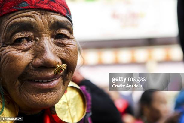 An elderly woman from ethnic Gurung Community in traditional attire takeÂ part in the New Year also known as Tamu Losar parade in Kathmandu, Nepal on...