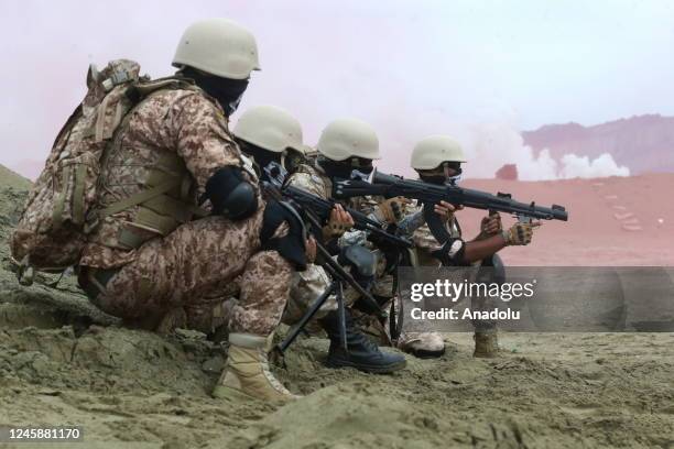 Iranian soldiers take part in an annual military drill in the coast of the Gulf of Oman and near the strategic Strait of Hormuz, in Jask, Iran on...