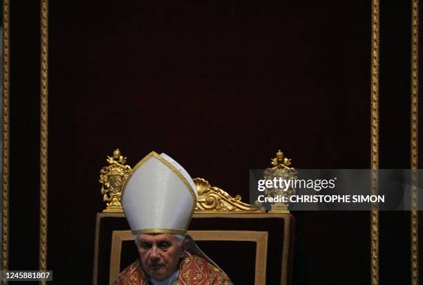 Pope Benedict XVI wears the Papal Tiara during the celebration of the Lord's Passion on Good Friday on April 2, 2010 at Saint Peter's Basilica at The...