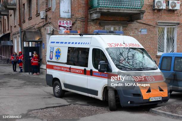 Ambulance workers provide medical assistance to residents of an apartment building in Kyiv, which suffered from a kamikaze drone attack by the...