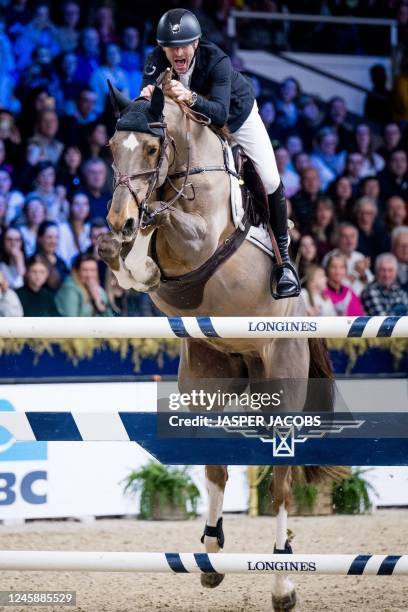 Belgian Pieter Devos with Mom's Toupie de la Roque pictured in action during the FEI World Cup Jumping competition at the 'Vlaanderens Kerstjumping -...