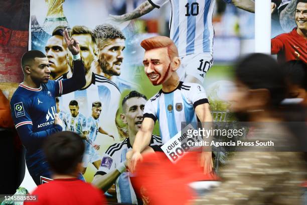 Large paper mache dolls of Argentine football player Lionel Messi are displayed as Ecuadorians prepare to receive 2023 on December 29, 2022 in...