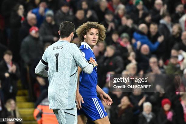 Leicester City's Welsh goalkeeper Danny Ward speaks to Leicester City's Belgian defender Wout Faes following his during the English Premier League...