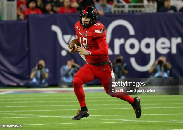 Texas Tech Red Raiders quarterback Tyler Shough carries the ball in the third quarter during the TaxAct Texas Bowl between the Texas Tech Red Raiders...