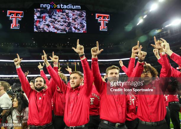 Texas Tech Red Raiders Saddle Tramps members celebrate the team victory during the TaxAct Texas Bowl between the Texas Tech Red Raiders and Ole Miss...