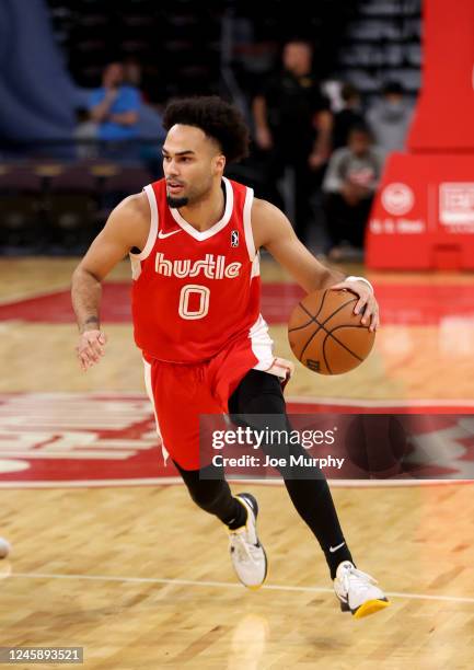 Jacob Gilyard of the Memphis Hustle dribbles the ball against the South Bay Lakers during an NBA G-League game on December 30, 2022 at Landers Center...