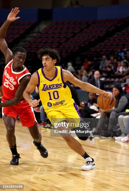 Max Christie of the South Bay Lakers dribbles the ball against the Memphis Hustle during an NBA G-League game on December 30, 2022 at Landers Center...