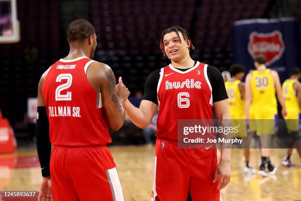 Xavier Tillman Sr. #2 and Kenneth Lofton Jr. #6 of the Memphis Hustle celebrate against the South Bay Lakers during an NBA G-League game on December...