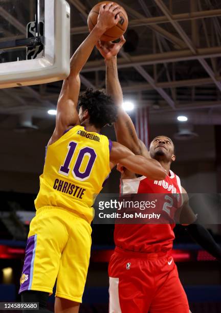 Xavier Tillman Sr. #2 of the Memphis Hustle blocks the shot by Max Christie of the South Bay Lakers during an NBA G-League game on December 30, 2022...