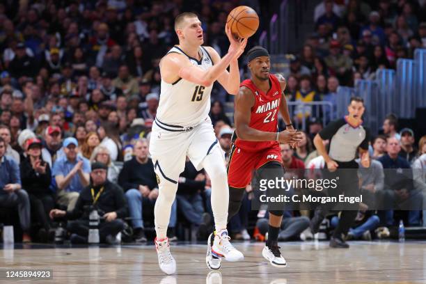 Nikola Jokic of the Denver Nuggets passes the ball against the Miami Heat during the third quarter at Ball Arena on December 30, 2022 in Denver,...