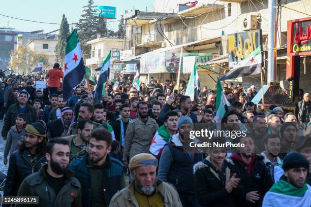 Demonstrators are raising Syrian opposition flags and placards as they rally against a potential rapprochement between Ankara and the Syrian regime...