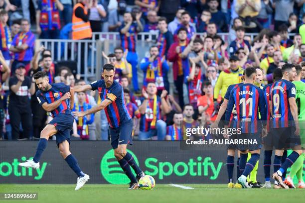 Barcelona's Spanish defender Jordi Alba reacts to being sent off the pitch after receiving a red card during the Spanish League football match...