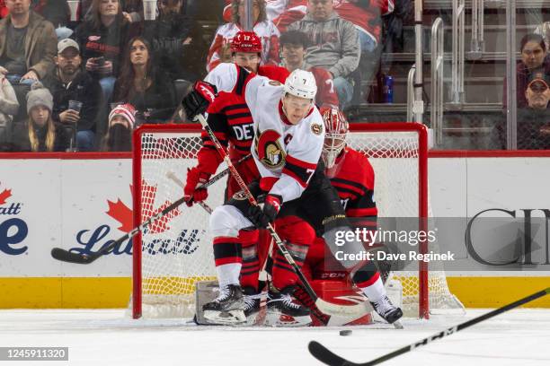 Brady Tkachuk of the Ottawa Senators tries to redirect a shot past Magnus Hellberg of the Detroit Red Wings during the first period an NHL game at...