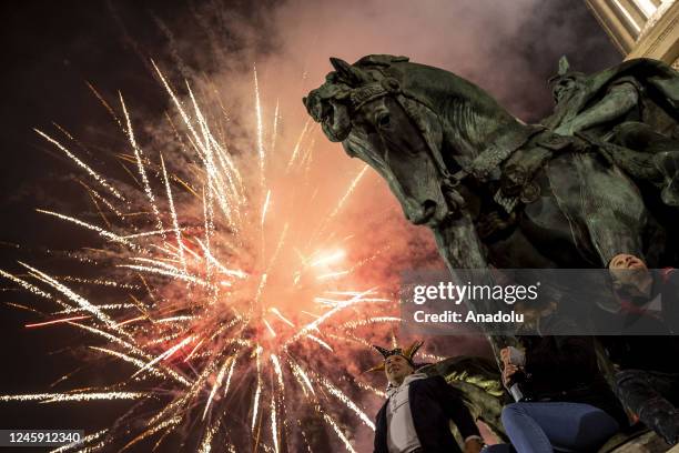 Fireworks light up the night sky over Heroes Square within the new year celebrations in Budapest, Hungary on January 01, 2023.