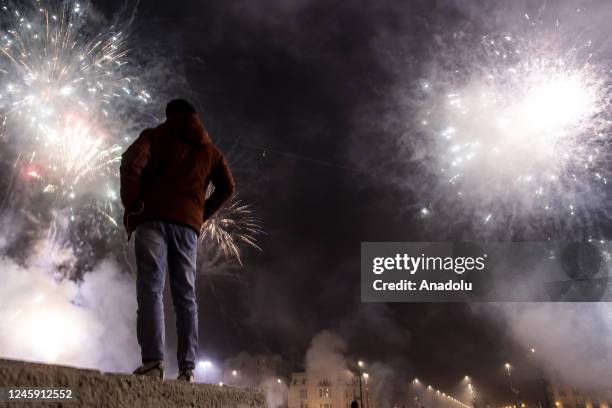 Fireworks light up the night sky over Heroes Square within the new year celebrations in Budapest, Hungary on January 01, 2023.