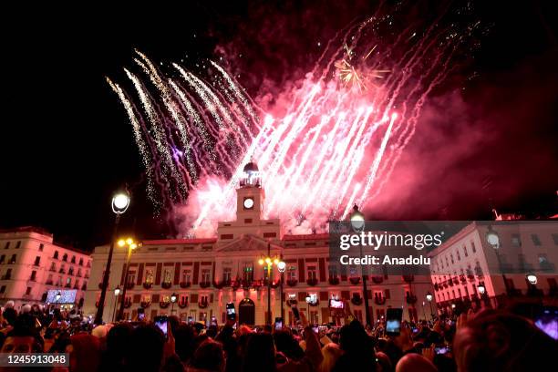 Fireworks go off at the Puerta del Sol during new year celebrations in Madrid, Spain on January 1, 2023. The city of Madrid welcomes the year 2023...