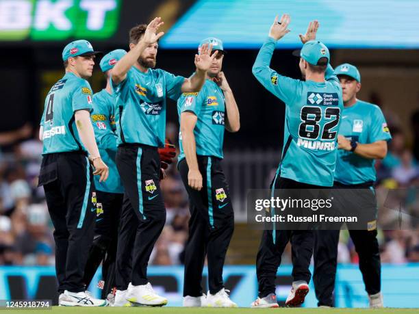 Michael Neser of the Heat celebrates the wicket of Josh Philippe of the Strikers during the Men's Big Bash League match between the Brisbane Heat and...