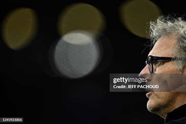 Lyon's French head coach Laurent Blanc looks on prior to the French L1 football match between Olympique Lyonnais and Clermont-Ferrand FC at The...