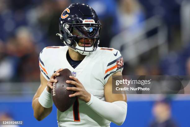 Chicago Bears quarterback Justin Fields goes to throw the ball ahead of an NFL football game between the Detroit Lions and the Minnesota Vikings in...