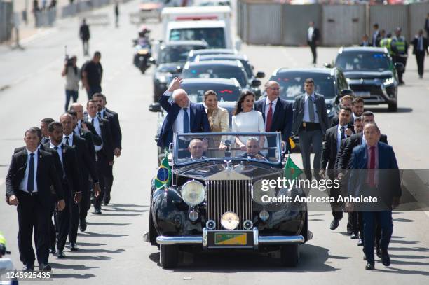 President-elect of Brazil Luiz Inacio Lula da Silva waves to supporters along his wife Rosangela da Silva, Vice-President-elect Geraldo Alckmin and...