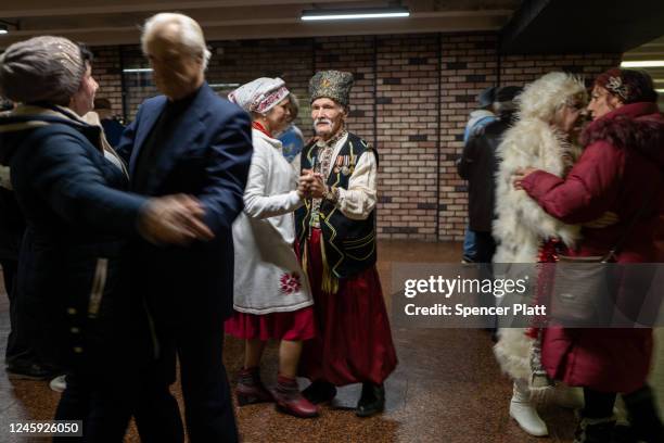 Elderly couples participate in an ongoing traditional dance gathering in an underground mall on January 01, 2023 in Kyiv, Ukraine. Kyiv, and much of...