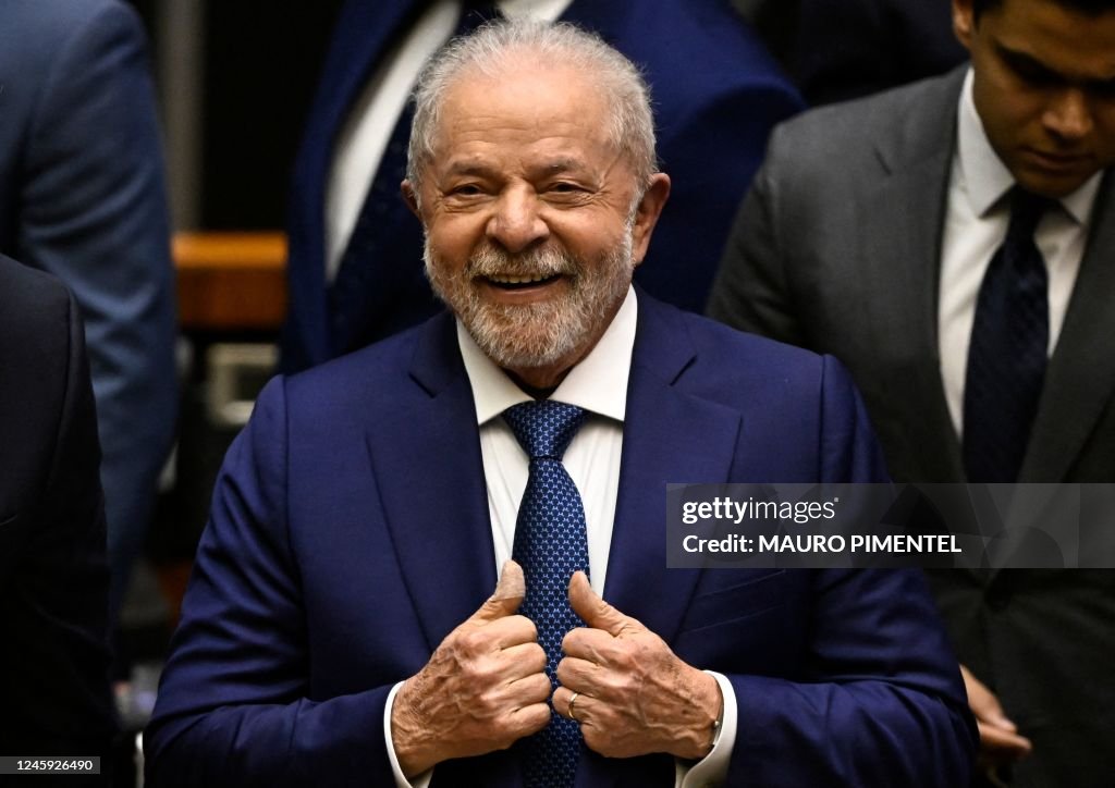 Lula M Brazil's new President Luiz Inacio Lula da Silva gives his thumbs up ...