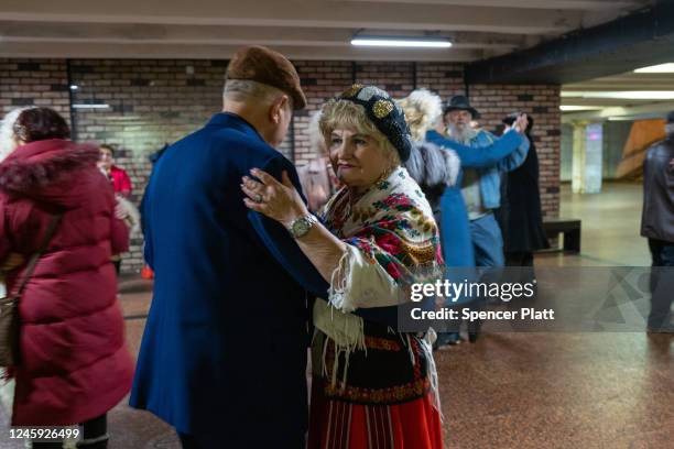 Elderly couples participate in an ongoing traditional dance gathering in an underground mall on January 01, 2023 in Kyiv, Ukraine. Kyiv, and much of...