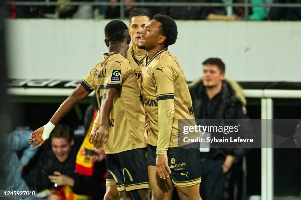 Lois Openda of RC Lens celebrates after scoring his team's 2nd goal during the Ligue 1 match between RC Lens and Paris Saint-Germain at Stade...