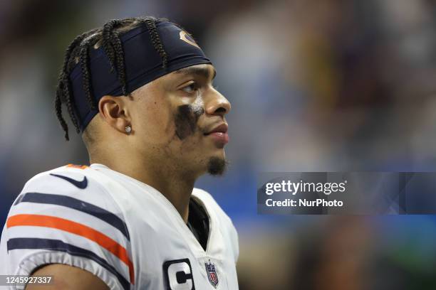 Chicago Bears quarterback Justin Fields walks off the field after the conclusion of an NFL football game against the Dertroit Lions in Detroit,...