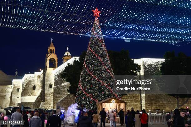 View of the Basilica of the Nativity and a Christmas tree in Bethlehem, Palestinian Territories on December 28, 2022.
