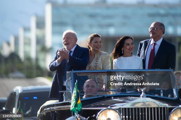 President-elect of Brazil Luiz Inacio Lula da Silva gestures to supporters along his wife Rosangela da Silva, Vice-President-elect Geraldo Alckmin...