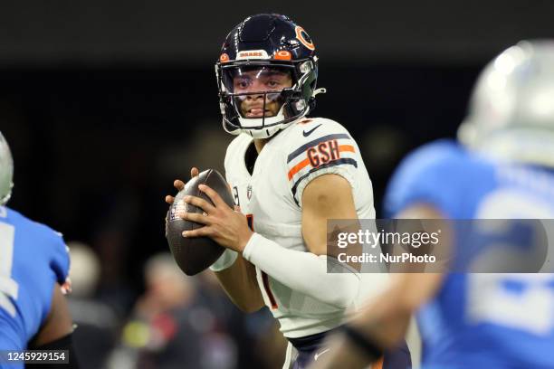 Chicago Bears quarterback Justin Fields looks to pass the ball during an NFL football game between the Detroit Lions and the Minnesota Vikings in...