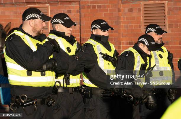 Police officers during a cinch Premiership match between Rangers and Celtic at Ibrox Stadium, on January 02 in Glasgow, Scotland.