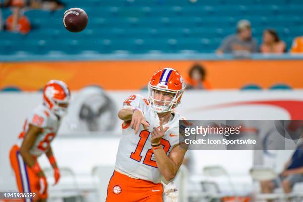 Clemson quarterback Hunter Johnson throws the ball on the field before the Capital One Orange Bowl college football game between the Tennessee...