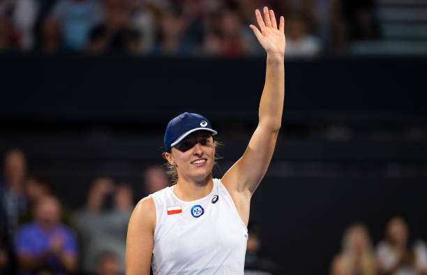 Iga Swiatek of Poland celebrates defeating Belinda Bencic of Switzerland in her second round-robin match on Day 5 of the United Cup at Pat Rafter...