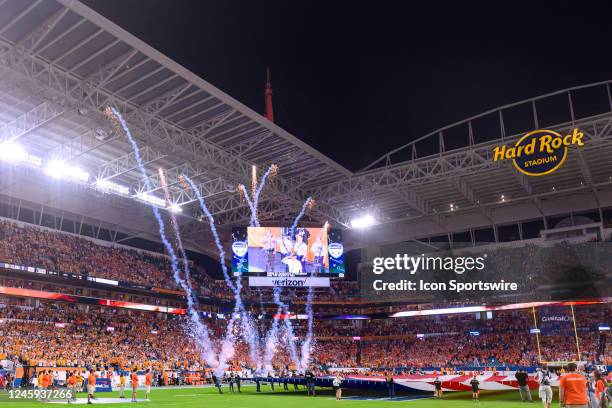 Fireworks shoot into the air during the singing of The National Anthem during the Capital One Orange Bowl college football game between the Tennessee...