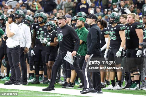 Ohio Bobcats head coach Tim Albin reacts to an officials call during the Mid-American Conference college football championship game between the...