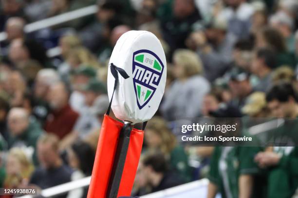 The MAC logo is seen on the ball marker during the Mid-American Conference college football championship game between the Toledo Rockets and the Ohio...