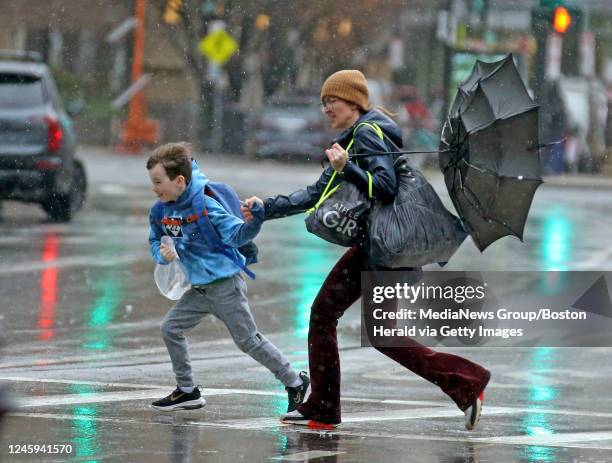 December 16: Pedestrians brave the wind and rain as a Nor'easter moves through on December 16, 2022 in Boston, Massachusetts.