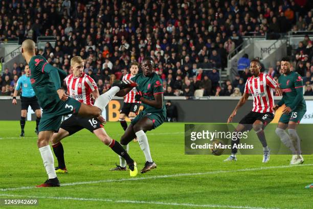Ibrahima Konate of Liverpool scores an own goal during the Premier League match between Brentford FC and Liverpool FC at Brentford Community Stadium...